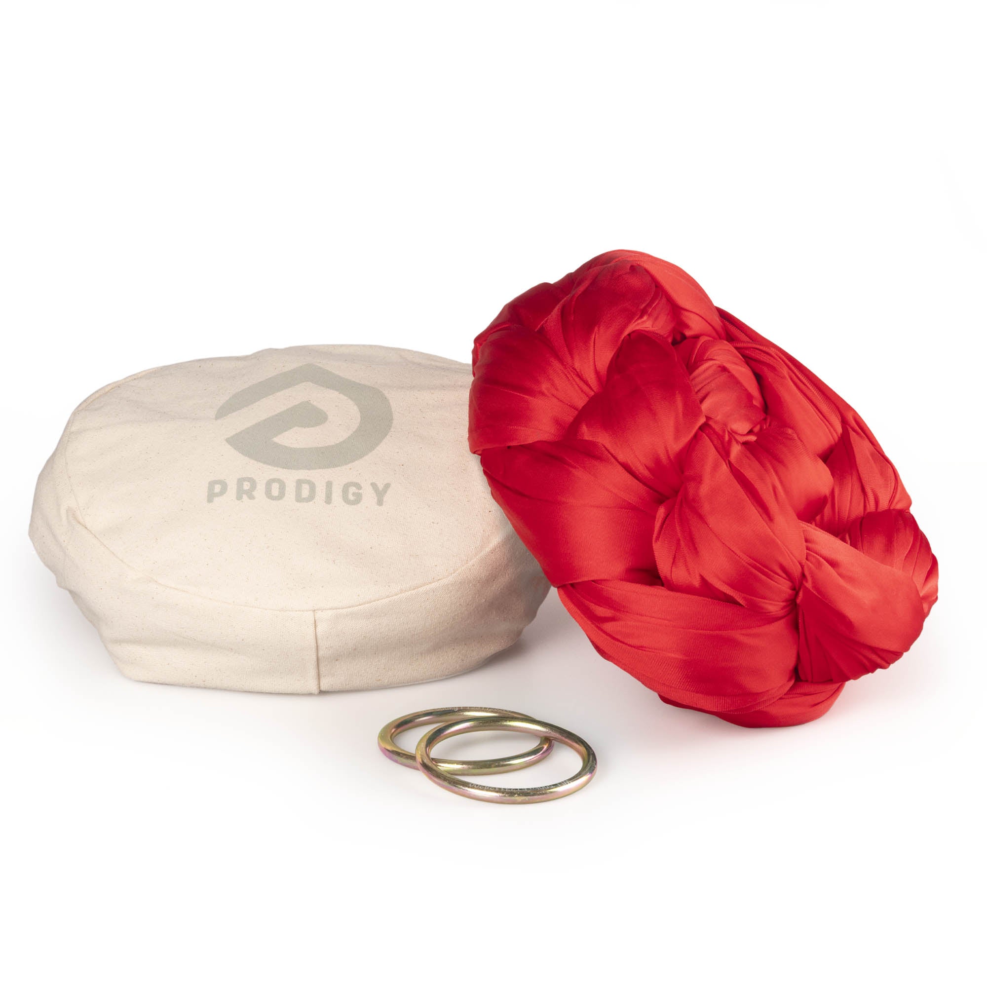 Red Aerial Sling resting on eco bag with O-rings laying in front