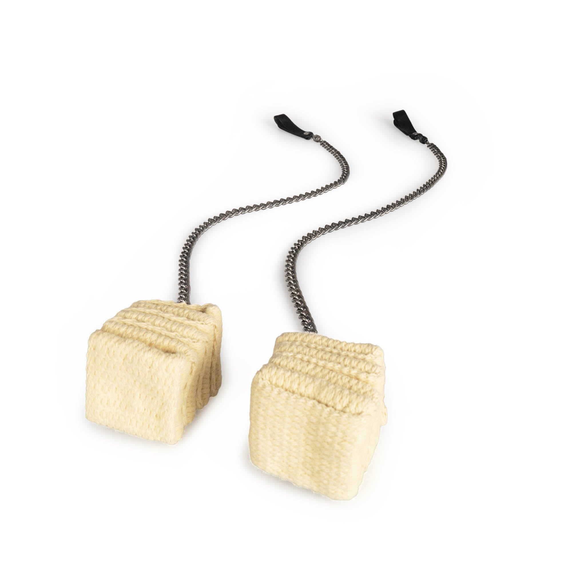 Trailblazer cathedral fire poi laying on white background with curve in the chain