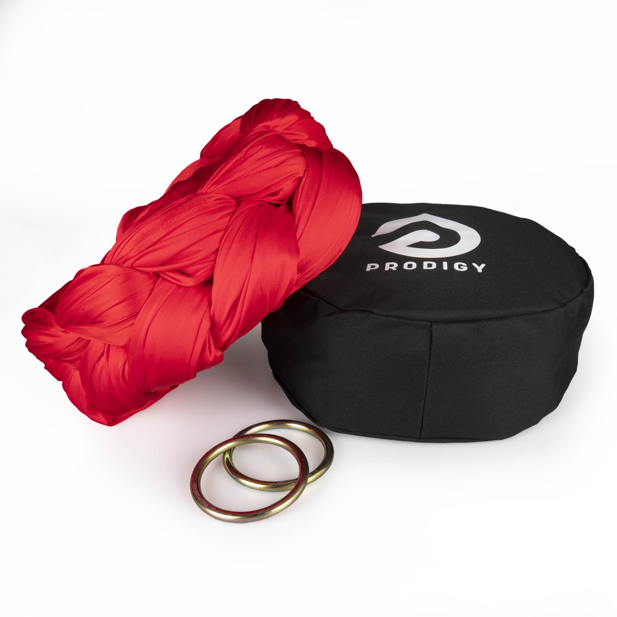 Prodigy 6m red aerial yoga hammock resting on hammock bag with the rings
