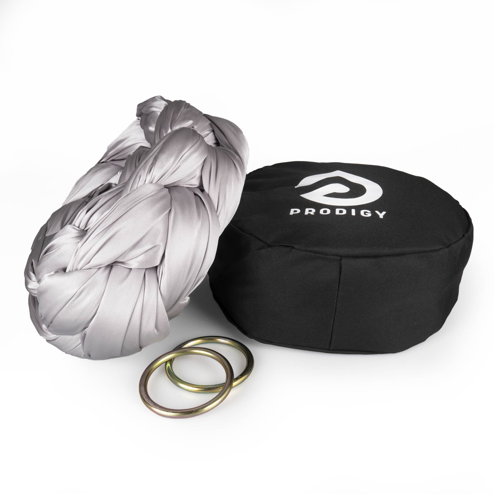 Prodigy 6m silver aerial yoga hammock resting on hammock bag with the rings
