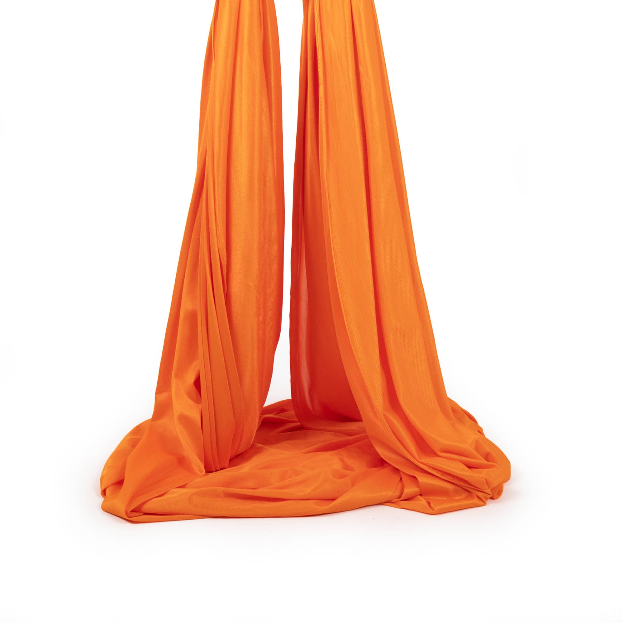 Orange yoga hammock piled up