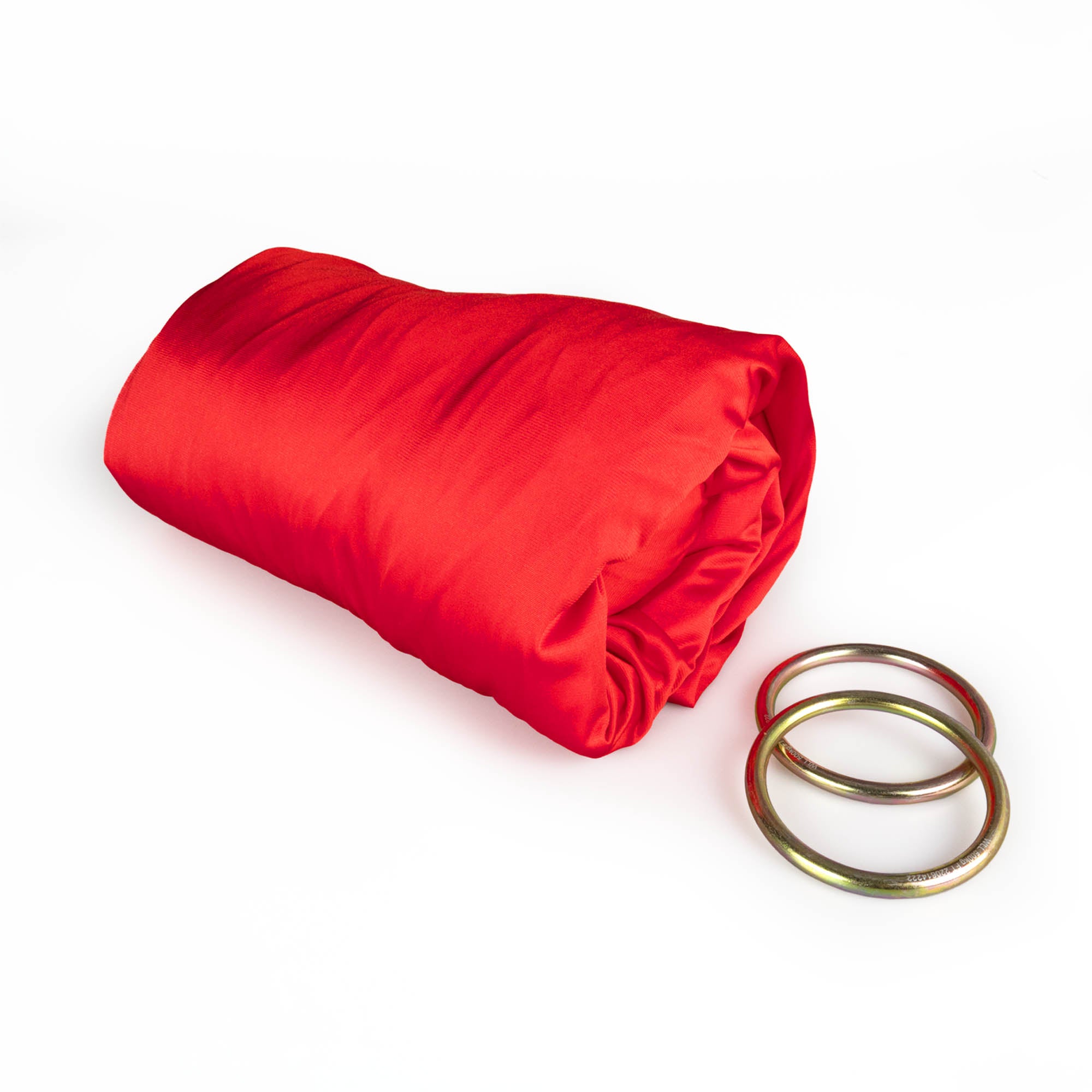 Red yoga hammock rolled up with ring dettached