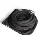 Black Leo cotton covered rope coiled up on bag