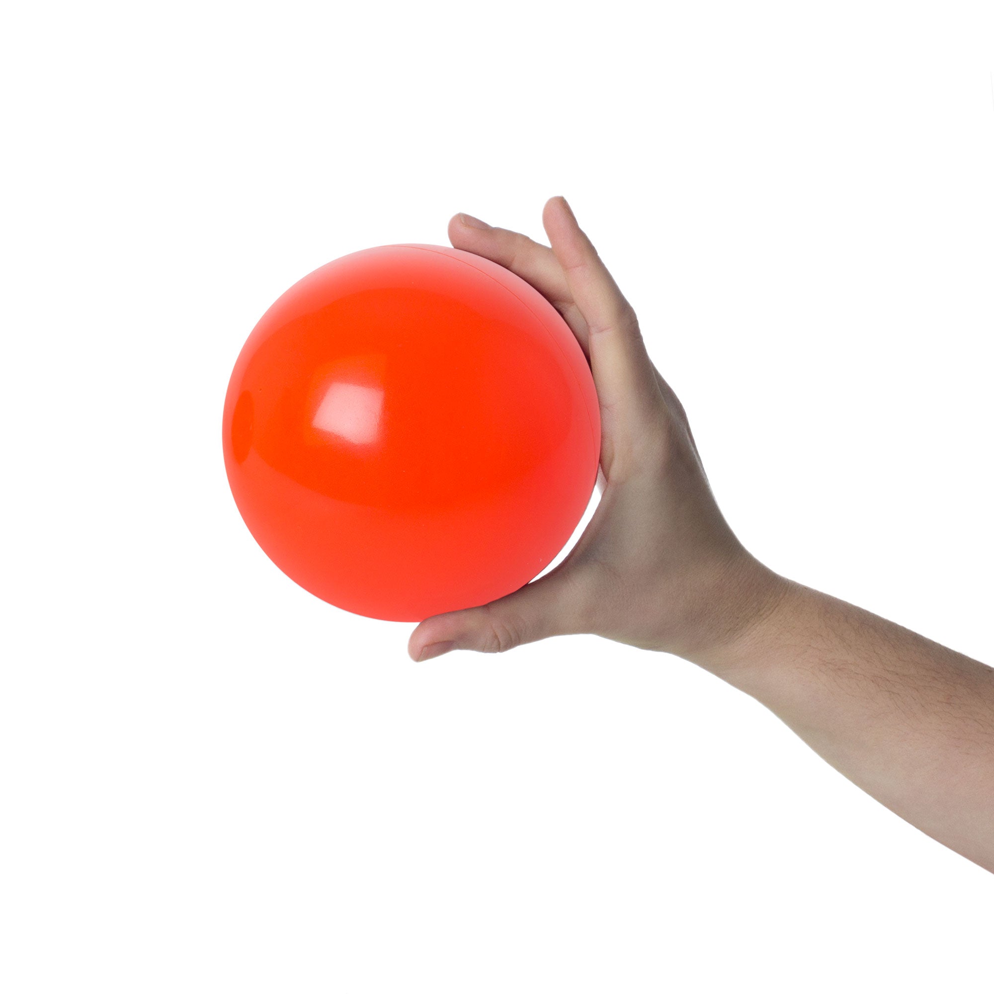 orange stage ball in hand