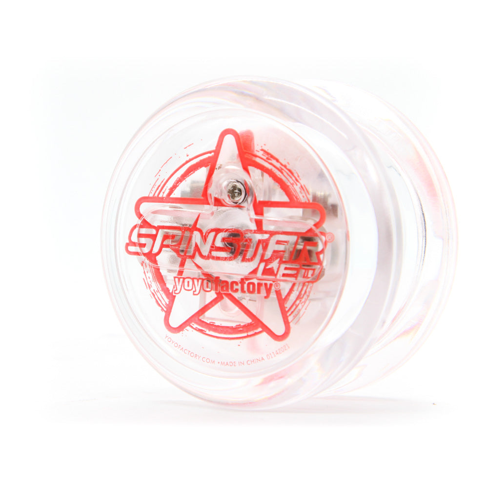 yoyo with clear body and red writing on the side