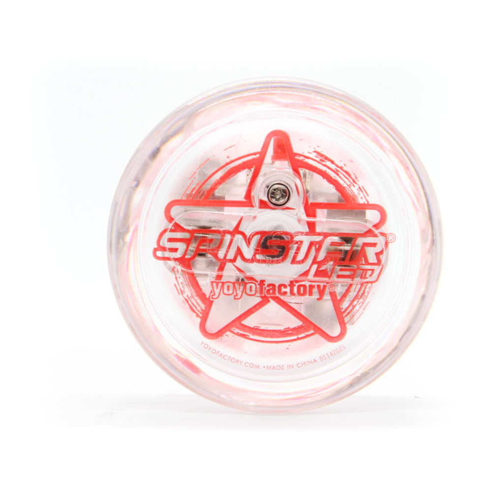 yoyo with clear body and red writing on the side